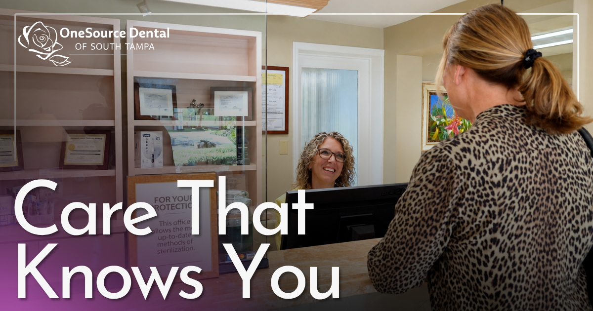 Care That Knows You woman smiling checking patient out of dental office